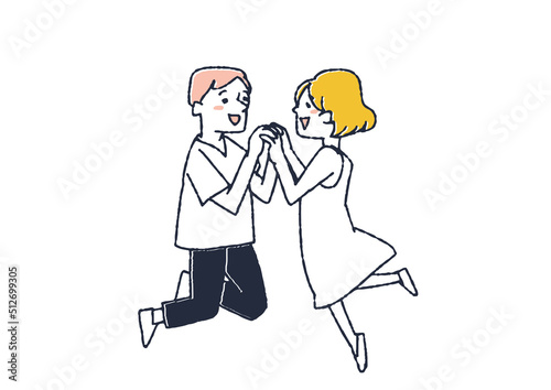 向かい合ってはしゃぐ二人　手を取り合い体を弾ませ喜ぶ男女