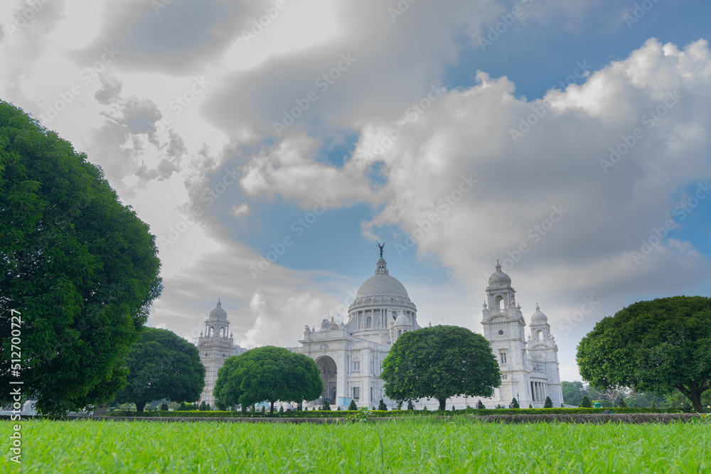 Kolkata, West Bengal, India - 28th August 2016 : Victoria Memorial with blue sky and white clouds. A very famous Historical Monument of Indian Architecture.