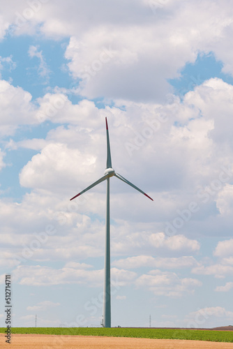 Wind power plant on the hills from Dobrogea, Romania. Landscape with wind turbines. Green energy industry. © Dragoș Asaftei