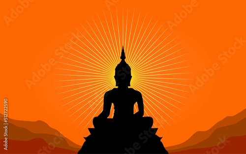 Buddha statue silhouette , yellow sunset on hilly area