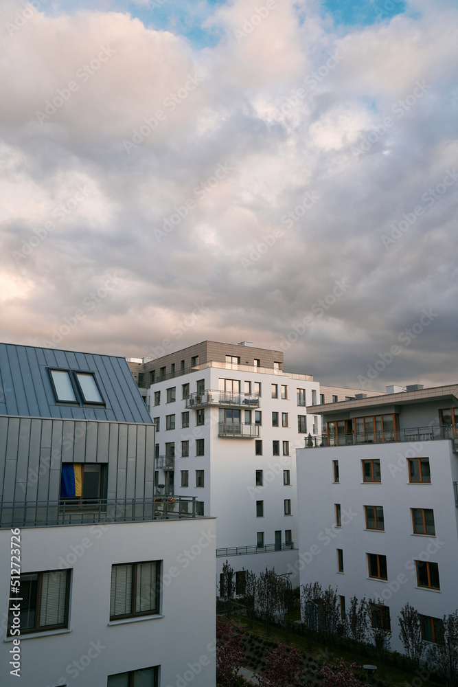 modern beautiful apartment house in European city. with bright facade and balconies.