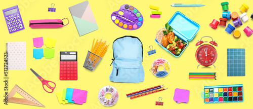 Backpack with set of school supplies on yellow background