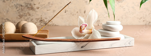 Canvas Print Beautiful spa composition with incense, flower and massage stones on table