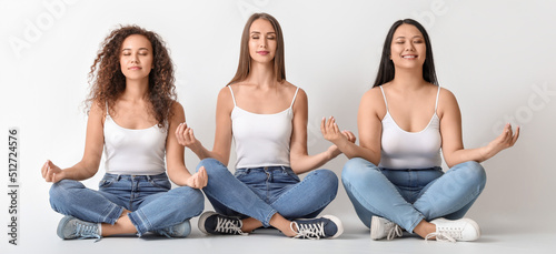 Portrait of meditating youn...