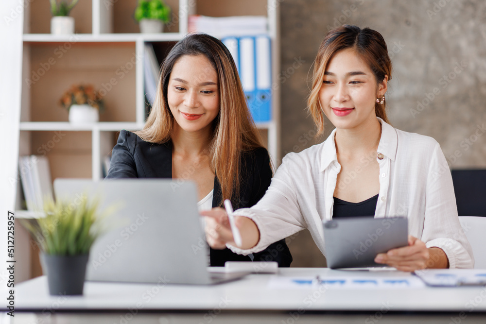 Cropped shot of Asian Business woman diverse coworkers working together in the boardroom, brainstorming, discussing, and analyzing business report strategy collaboration. Cropped shot of Asian Business woman diverse coworkers working together in the boardroom, brainstorming, discussing, and analyzing business report strategy collaboration.
