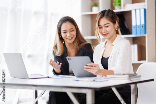 Cropped shot of Asian Business woman diverse coworkers working together in the boardroom, brainstorming, discussing, and analyzing business report strategy collaboration.
