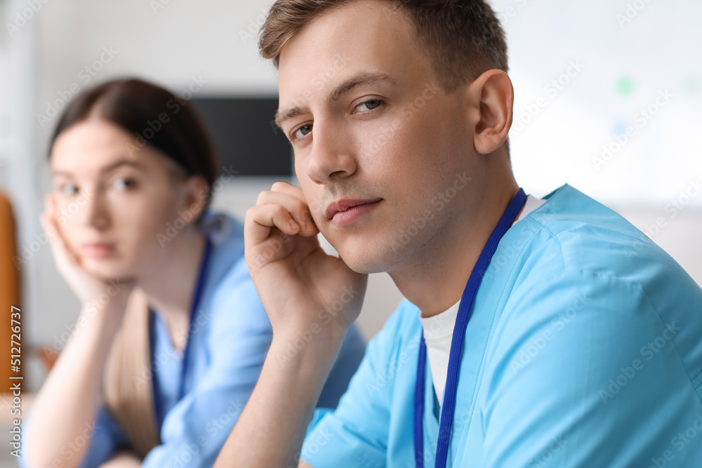 Male medical assistant working in clinic, closeup Male medical assistant working in clinic, closeup