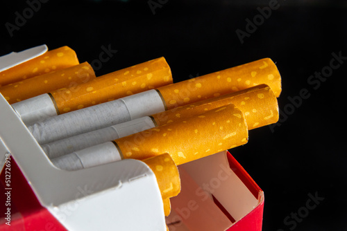 Close up cigarette in pack is addictive to be cancer.smoking reduction campaign in World No Tobacco Day