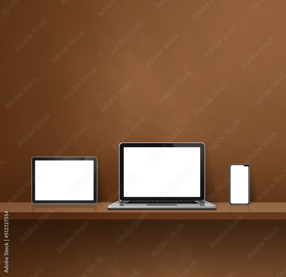 Laptop, mobile phone and digital tablet pc on brown wall shelf. Square background Laptop, mobile phone and digital tablet pc on brown wall shelf. Square background