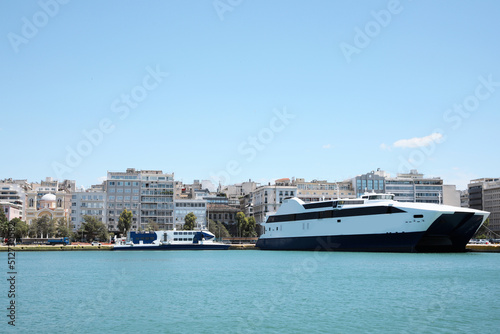 Modern ferry in sea port on sunny day © New Africa