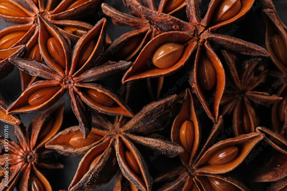 Aromatic anise stars as background, top view Aromatic anise stars as background, top view