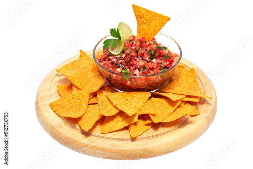 Glass bowl of tomato salsa dip with Tortilla chips isolated on white background