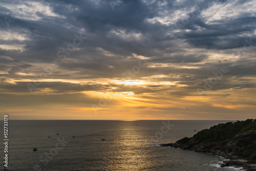 The sun is falling in sunset time at Promthep Cape in Phuket, Thailand.