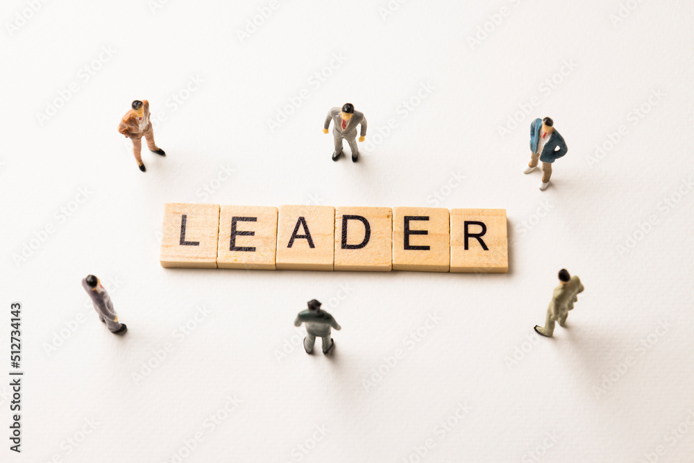 businessman figures at leader words