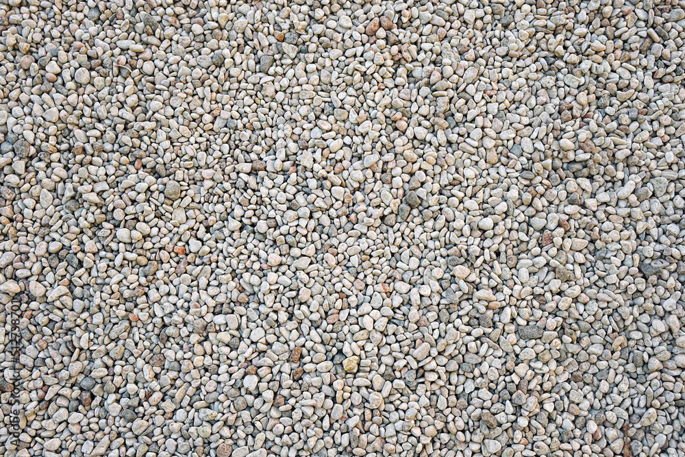 abstract natural background of gray pebble stones. Many grunge stones, construction rocks texture. template for design. flat lay abstract natural background of gray pebble stones. Many grunge stones, construction rocks texture. template for design. flat lay