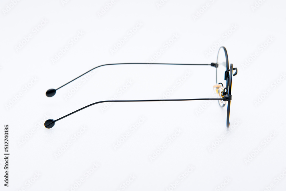 Fashion sunglasses round shape and black frames on white background. Fashion sunglasses round shape and black frames on white background.