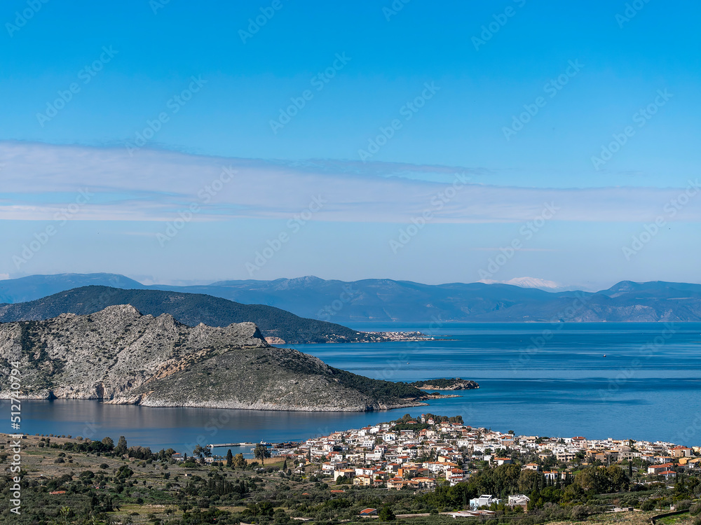 Tree Islands plus one. Aegina, Agistri, Moni and Peloponnese in the far background. Travelling in alluring Saronic gulf sea. Greek destinations around Athens.