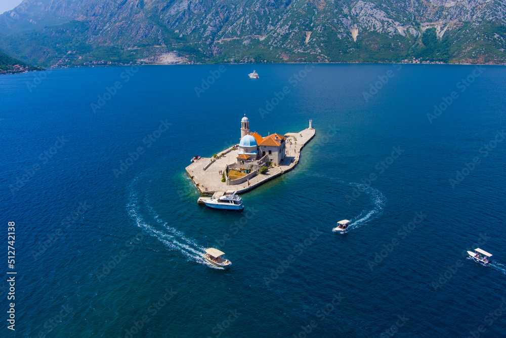 Montenegro. Bay of Kotor. The island of Gospa od Skrpela is located near the city of Perast. Popular tourist spot. Drone. Aerial view