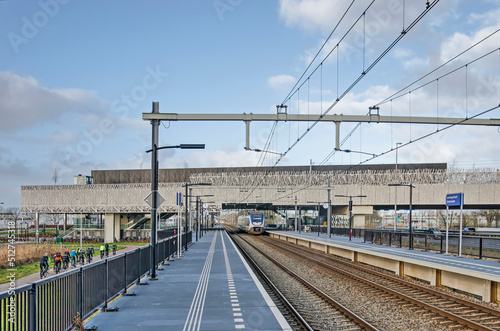 Zoetermeer, The Netherlands, January 30, 2022: various modes of transport, bicycle, train, highway, meet at the Zoetermeer-Lansingerland railway station