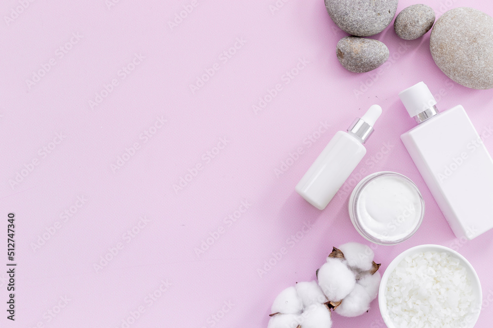 Set of white cosmetic products with bottle and tube, top view Set of white cosmetic products with bottle and tube, top view