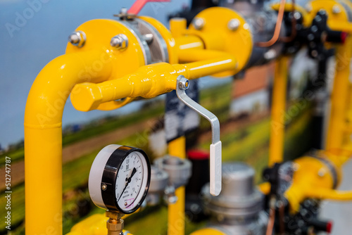 Valve connection of pipes under pressure, barometer of atmospheric voltage, yellow gas pipes, oil products plant, water shut-off valve.