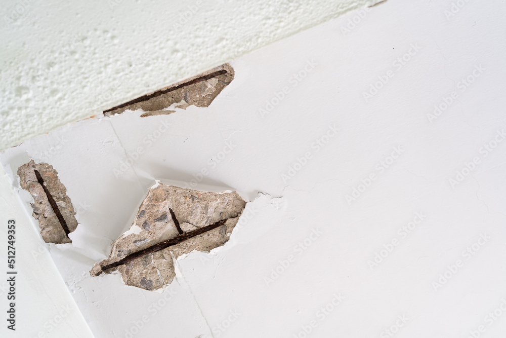 Water damaged ceiling roof in an old house. Water damage building ...