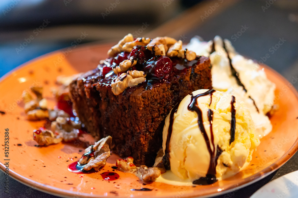 Piece of brownie chocolate cake with vanilla ice cream Piece of brownie chocolate cake with vanilla ice cream