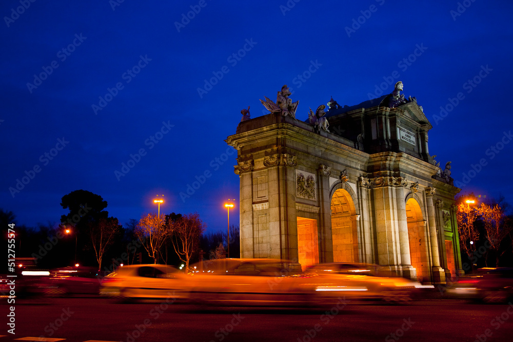 The famous Puerta de Alcala at night in the city of Madrid capital of Spain