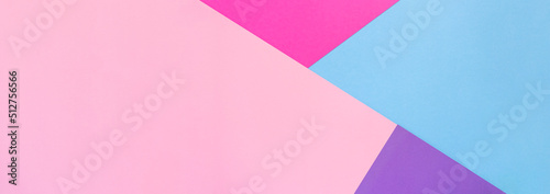 Banner with pink, purple, violet and light blue paper background. Geometric figures, shapes, lines. Multicolor abstract flat lay. Back to school concept. Copy space, top view.