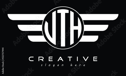 VTH three letter circle with wings logo design vector template. wordmark logo | emblem logo | monogram logo | initial letter logo | typography logo | business logo | minimalist logo |	 photo