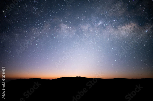 Beautiful view on top of the mountain, night sky, star and Milky Way over the sky.