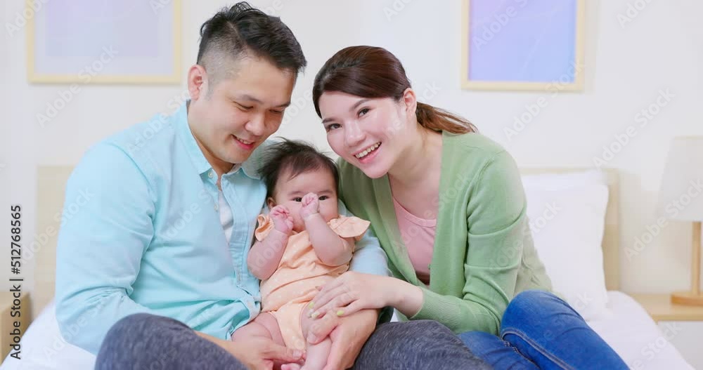 Young parents play with baby Young parents play with baby