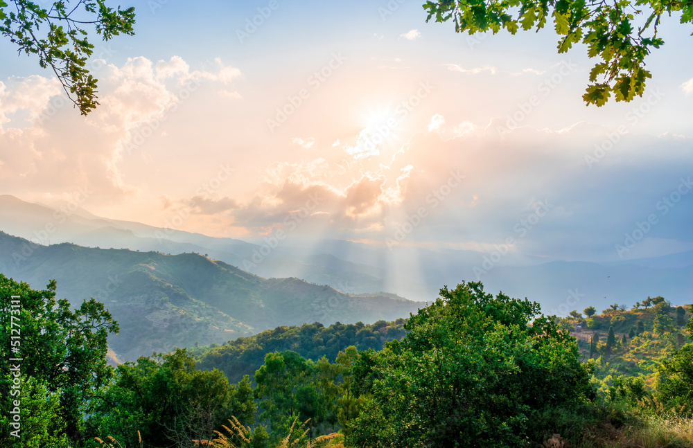 Obraz premium Mountain valley during sunset or sunrise. Natural spring or summer season landscape