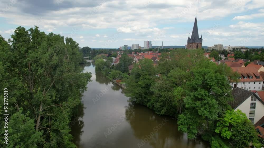 The drone flies over a rural landscape over the river Regnitz and the suburb of Erlangen-Bruck
The drone flies over a rural landscape over the river Regnitz and the suburb of Erlangen-Bruck