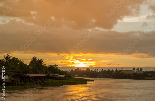 Golden sky above Tha Chin river(Maenam Tha Chin),Nakhon Pathom,Thailand during sunset