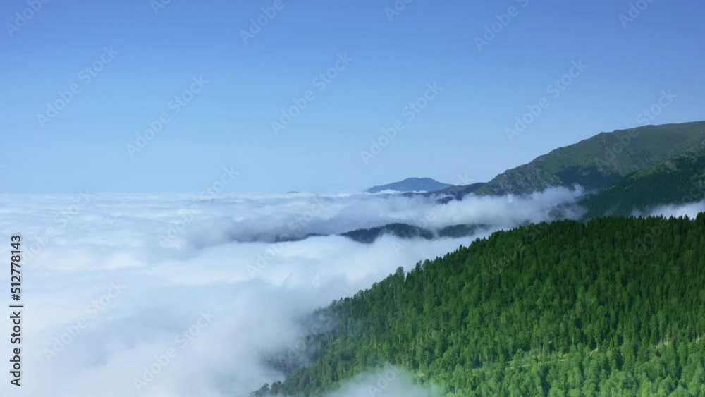 Sea of clouds landscape from mountain at above the cloud.Mists over forest and black sea meadows.Moist and humid air movement.Cloudy cotton cloudscape overcast cumulus.Time lapse nature.4K.1 Sea of clouds landscape from mountain at above the cloud.Mists over forest and black sea meadows.Moist and humid air movement.Cloudy cotton cloudscape overcast cumulus.Time lapse nature.4K.1