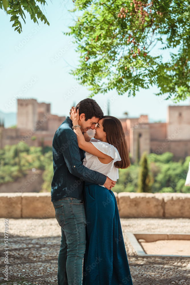 beautiful couple hugging and looking at each other