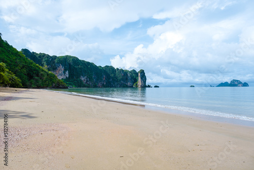 Aonang Krabi Thailand, Aonang beach during rain season in Thailand. empty beach during rain season photo