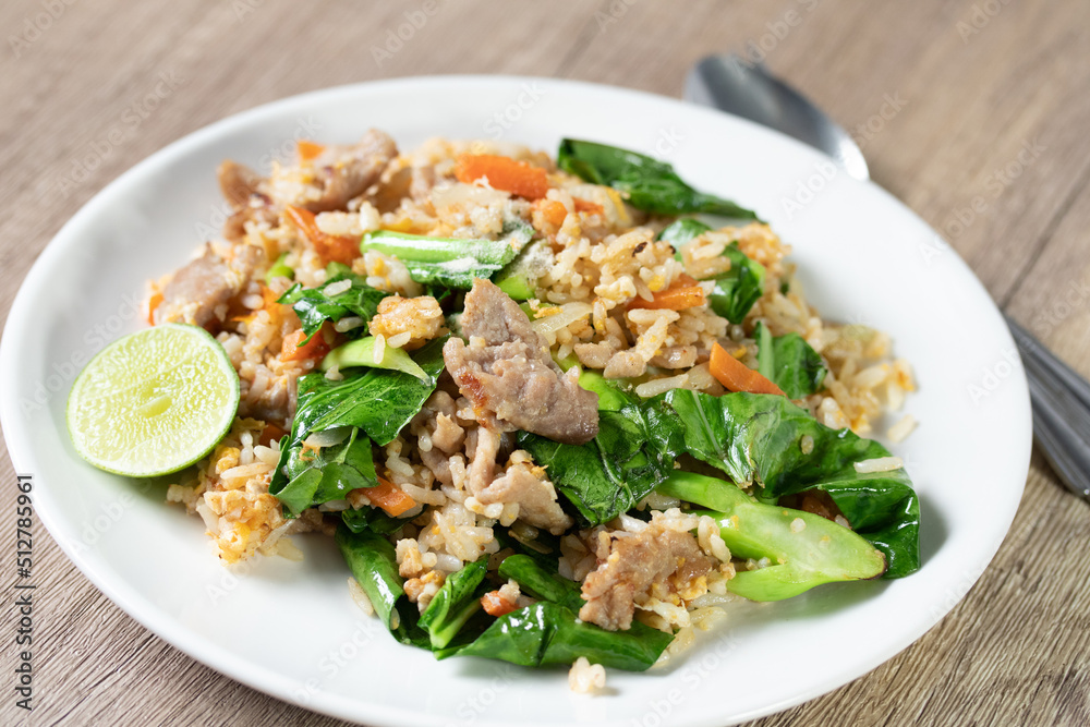 Fried rice with pork and egg, Thai street food Fried rice with pork and egg, Thai street food
