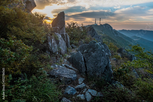 Scenic view of mountains against sky during sunrise