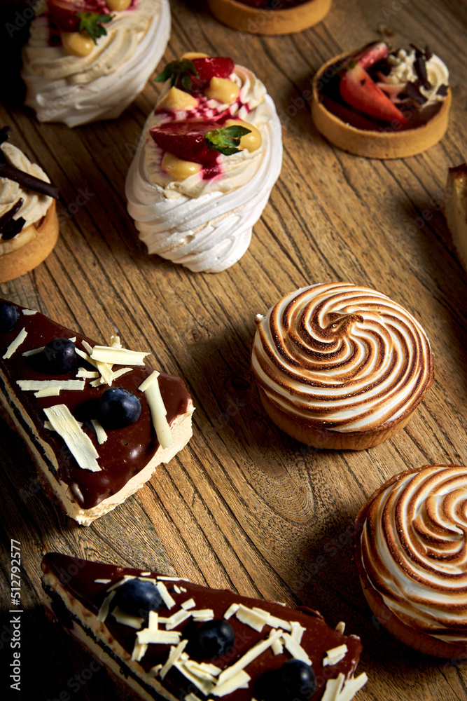 Tartlets with chocolate, strawberry , bundt cakes, on the wood table.
Tasty homemade caramel cheesecake. Tartlets with chocolate, strawberry , bundt cakes, on the wood table.
Tasty homemade caramel cheesecake.
