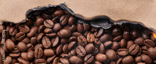 Roasted smoking coffee beans macro close up creative background