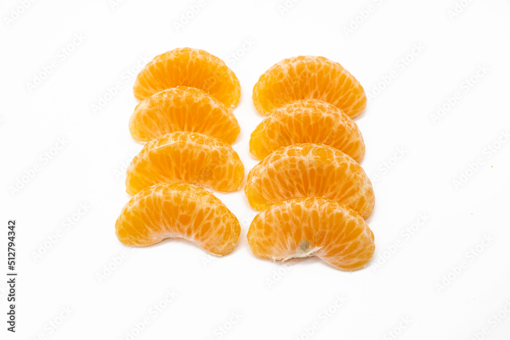 some pieces of tangerine isolated on white background some pieces of tangerine isolated on white background