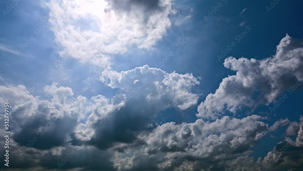 Typhoon day in summer. Clouds are constantly changing shape in the blue sky. 4K sky cloud time lapse.