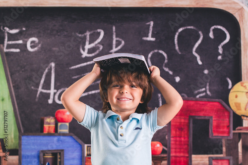 back to school kid pre k child in front of board chalk chalkboard a b c    