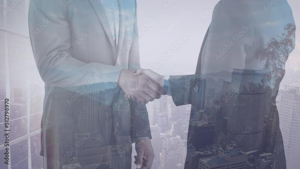 Animation of diverse business people shaking hands over cityscape Animation of diverse business people shaking hands over cityscape