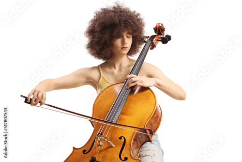 Casual young woman playing a cello photo