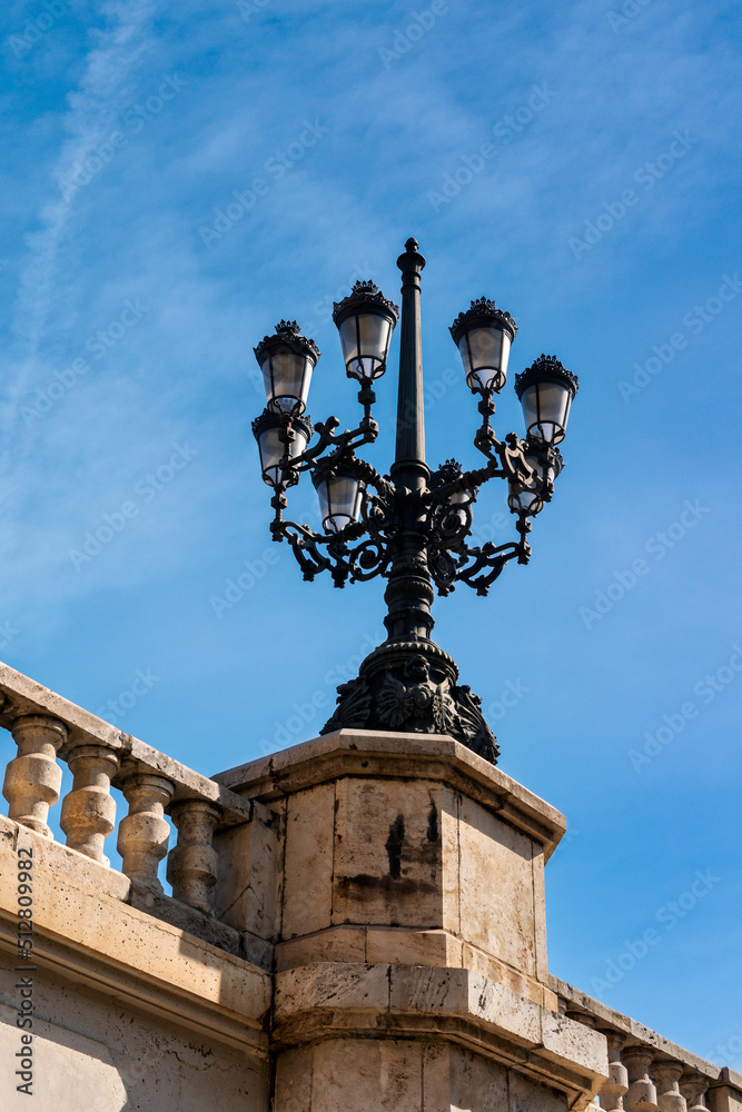 Ornate Lighting on one of the bridges in Valencia in Spain