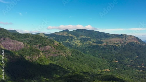 Aerial drone of Jungle and mountains in Sri Lanka. Mountain slopes with tropical vegetation. Riverston. photo