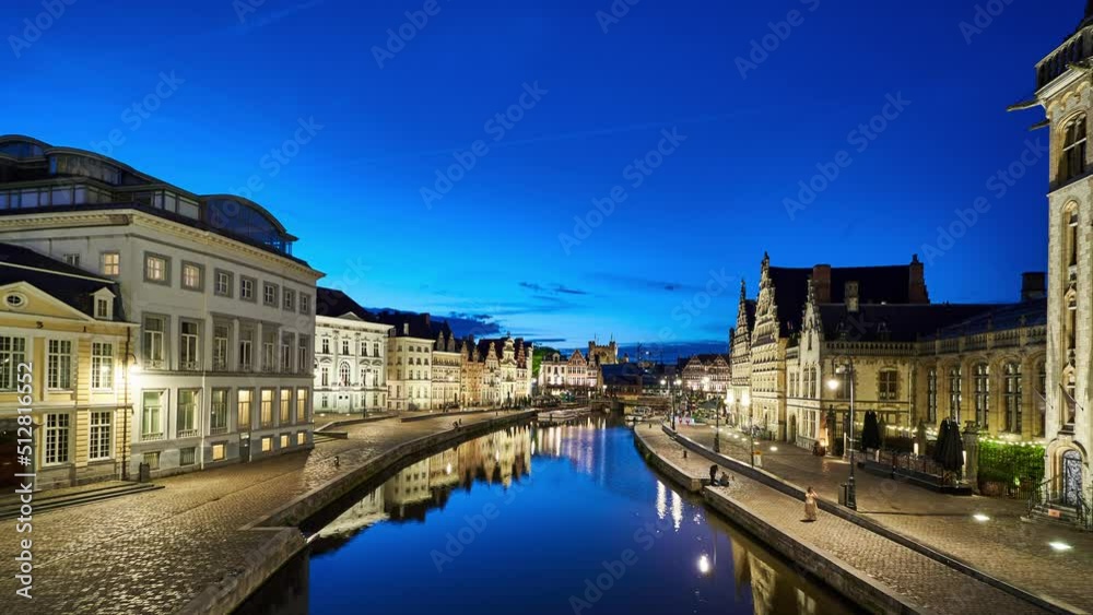 Ghent night timelapse showing the Leie (Lys) river and historic waterfront buildings. Belgium Ghent night timelapse showing the Leie (Lys) river and historic waterfront buildings. Belgium